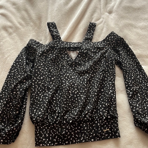 bebe Tops - Bebe cold shoulder polka dots top